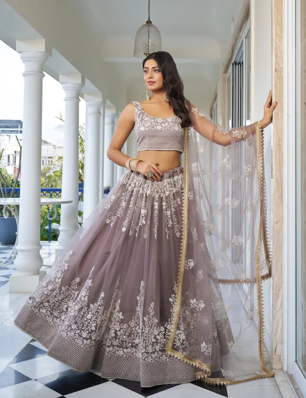 Designer Dusty Rose Net Lehenga Choli with Sequins Detailing
